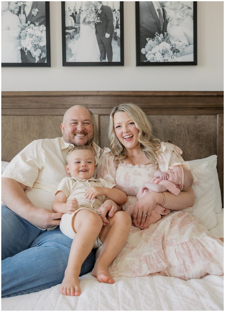 "Newborn baby sleeping peacefully on a soft white blanket."

"Close-up of a swaddled newborn baby with eyes closed."

"Newborn lying in a wicker basket with a knitted blanket."

"Baby girl wearing a pink headband, sleeping on her stomach."

"Father holding newborn gently against his chest."

"Newborn twins wrapped in matching blankets, sleeping side by side."

"Black and white photo of a newborn holding a parent's finger."

"Newborn baby yawning while lying in a cozy, neutral-toned setting."
"Big brother gently kissing newborn sibling on the forehead as parents look on smiling."

"Family of four sitting on a bed, with the big brother holding the newborn baby in his lap."

"Parents cuddling their newborn while big brother sits beside them, smiling at the baby."

"Big brother lying next to his newborn sibling on a cozy blanket during a family photo shoot."

"Mother holding newborn baby while big brother stands beside her with his arm around her shoulder."

"Father cradling newborn in his arms while big brother peeks over to look at the baby."

"Black and white photo of big brother holding newborn, surrounded by loving parents."
Jordan Rivera Photography lifestyle newborn session in Houston home, capturing parents cuddling their baby in natural light."

"Authentic family moments during an in-home newborn lifestyle session by Jordan Rivera Photography in Houston."

"New parents lovingly holding their newborn in cozy home setting, photographed by Jordan Rivera Photography."

"Candid Houston lifestyle newborn photography by Jordan Rivera Photography, showing family connection and warmth."

"Natural light lifestyle newborn portraits by Jordan Rivera Photography, capturing intimate family moments at home in Houston."